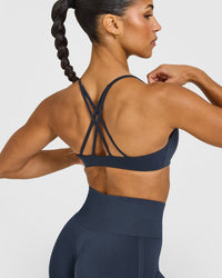 EasyLift™ Strappy Sports Bra with White Logo | True Blue