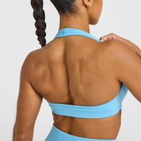 EffortlessLift™ Seamless Halter Neck Sports Bra with White Logo | Arctic Blue