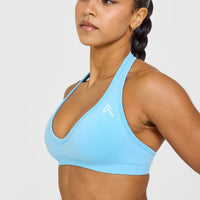 EffortlessLift™ Seamless Halter Neck Sports Bra with White Logo | Arctic Blue