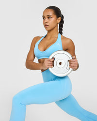 EffortlessLift™ Seamless Halter Neck Sports Bra with White Logo | Arctic Blue