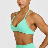 EnhanceLift™ Seamless Minimal Halter Neck Bralette with White Logo | Peppermint Green