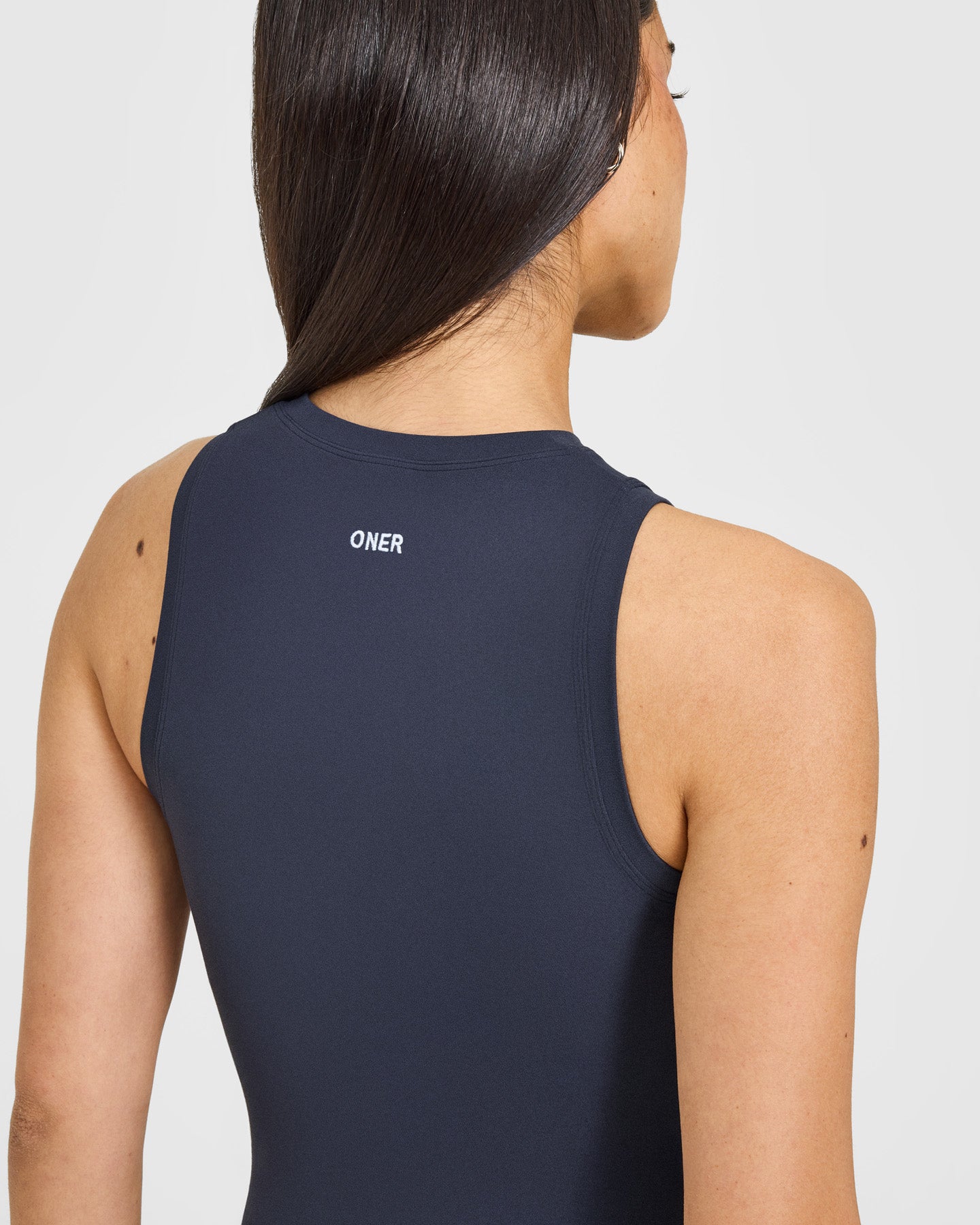 SoftMotion™ High Neck Mid Vest with White Logo | True Blue