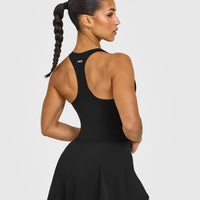 SoftMotion™ Racer Back Mid Vest with Built in Bra Shelf with White Logo | Black