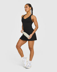 SoftMotion™ Racer Back Mid Vest with Built in Bra Shelf with White Logo | Black
