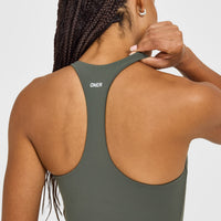 SoftMotion™ Racer Back Mid Vest with Built in Bra Shelf with White Logo | Dark Khaki