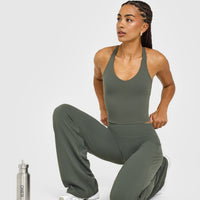 SoftMotion™ Racer Back Mid Vest with Built in Bra Shelf with White Logo | Dark Khaki