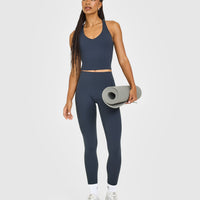 SoftMotion™ Racer Back Mid Vest with Built in Bra Shelf with White Logo | True Blue