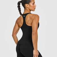 SoftMotion™ Racer Back Vest with Built in Bra Shelf with White Logo | Black