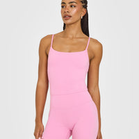 SoftMotion™ Strappy Mid Vest with Built in Bra Shelf with White Logo | Rose Pink