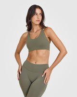 SoftMotion™ Sports Bra with White Logo | Alpine Green