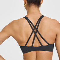 EasyLift™ High Neck Sports Bra with White Logo | Coal