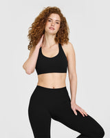 SoftMotion™ Sports Bra with White Logo | Black