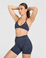 EnhanceLift™ Seamless Minimal Halter Neck Bralette with White Logo | True Blue