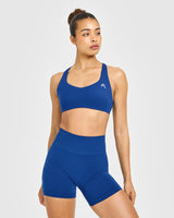 EasyLift™ Cross Back Sports Bra with White Logo | Vintage Navy