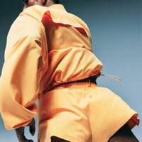 AirMove™ Lined Shorts 2" with Pocket and Reflective Logo | Powdered Orange