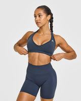 Effortless Seamless Halter Neck Sports Bra with White Logo | True Blue