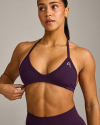 EnhanceLift™ Seamless Minimal Halter Neck Bralette with Grey Logo | Blackberry Purple