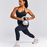 EnhanceLift™ Seamless Strappy Racer Tank Top with Built in Bra Shelf with Gray Logo | True Blue