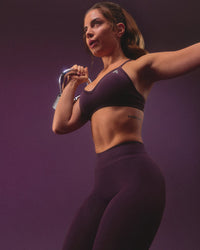 EnhanceLift™ Seamless Strappy Sports Bra with Grey Logo | Blackberry Purple