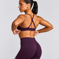 EnhanceLift™ Seamless Strappy Sports Bra with Grey Logo | Blackberry Purple