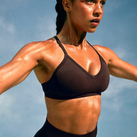 EnhanceLift™ Seamless Strappy Sports Bra with Gray Logo | 70% Cocoa
