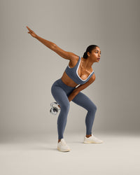 EffortlessLift™ Seamless Mid Rise Leggings with Grey Logo | Light Granite Blue