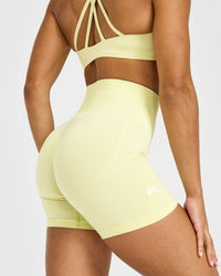 EffortlessLift™ Seamless Shorts with White Logo | Pastel Yellow