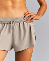 AirMove™ Lined Pocket Shorts 2" | Warm Sand