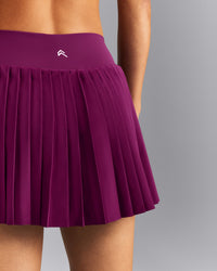 AirMove™ Pleated Skort with Pockets | Ripe Fig