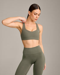 EasyLift™ Cross Back Sports Bra with Grey Logo | Alpine Green