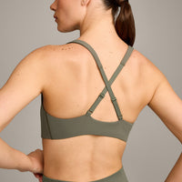 EasyLift™ Cross Back Sports Bra with Grey Logo | Alpine Green
