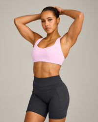 EasyLift™ Cross Back Sports Bra with Grey Logo | Chalk Pink
