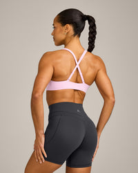EasyLift™ Cross Back Sports Bra with Grey Logo | Chalk Pink