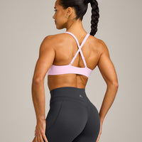 EasyLift™ Cross Back Sports Bra with Grey Logo | Chalk Pink