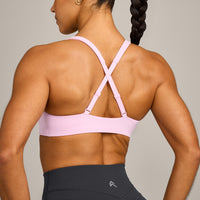EasyLift™ Cross Back Sports Bra with Grey Logo | Chalk Pink