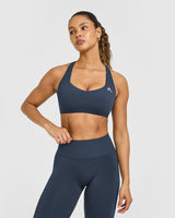 EasyLift™ Cross Back Sports Bra with White Logo | True Blue