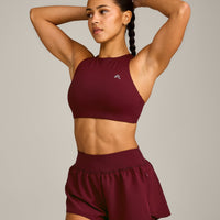 EasyLift™ High Neck Sports Bra with Grey Logo | Rosewood