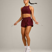 EasyLift™ High Neck Sports Bra with Grey Logo | Rosewood