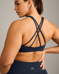 EasyLift™ High Neck Sports Bra with Grey Logo | True Blue