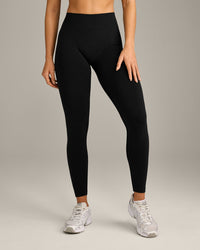 EffortlessLift™ Seamless Mid Rise Leggings with Grey Logo | Black