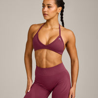 EnhanceLift™ Seamless Minimal Halter Neck Bralette with Grey Logo | Burnt Maroon