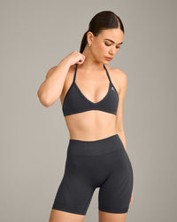 EnhanceLift™ Seamless Minimal Halter Neck Bralette with Grey Logo | Coal