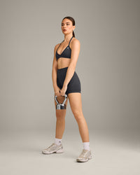 EnhanceLift™ Seamless Minimal Halter Neck Bralette with Grey Logo | Coal