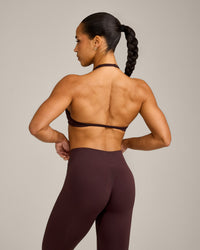 EnhanceLift™ Seamless Minimal Halter Neck Bralette with Grey Logo | Plum Brown