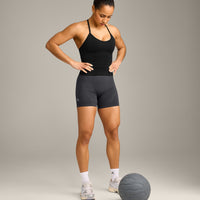 EnhanceLift™ Seamless Strappy Racer Vest with Built in Bra Shelf with Grey Logo | Black