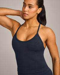 EnhanceLift™ Seamless Strappy Racer Vest with Built in Bra Shelf with Grey Logo | True Blue