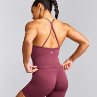 EnhanceLift™ Seamless Strappy Racer Tank Top with Built in Bra Shelf with Gray Logo | Burnt Maroon Red