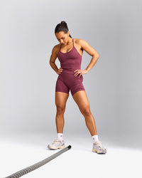 EnhanceLift™ Seamless Strappy Racer Tank Top with Built in Bra Shelf with Gray Logo | Burnt Maroon Red
