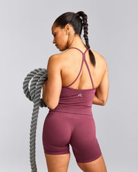 EnhanceLift™ Seamless Strappy Racer Tank Top with Built in Bra Shelf with Gray Logo | Burnt Maroon Red