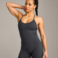EnhanceLift™ Seamless Strappy Racer Vest with Built in Bra Shelf with Grey Logo | Coal